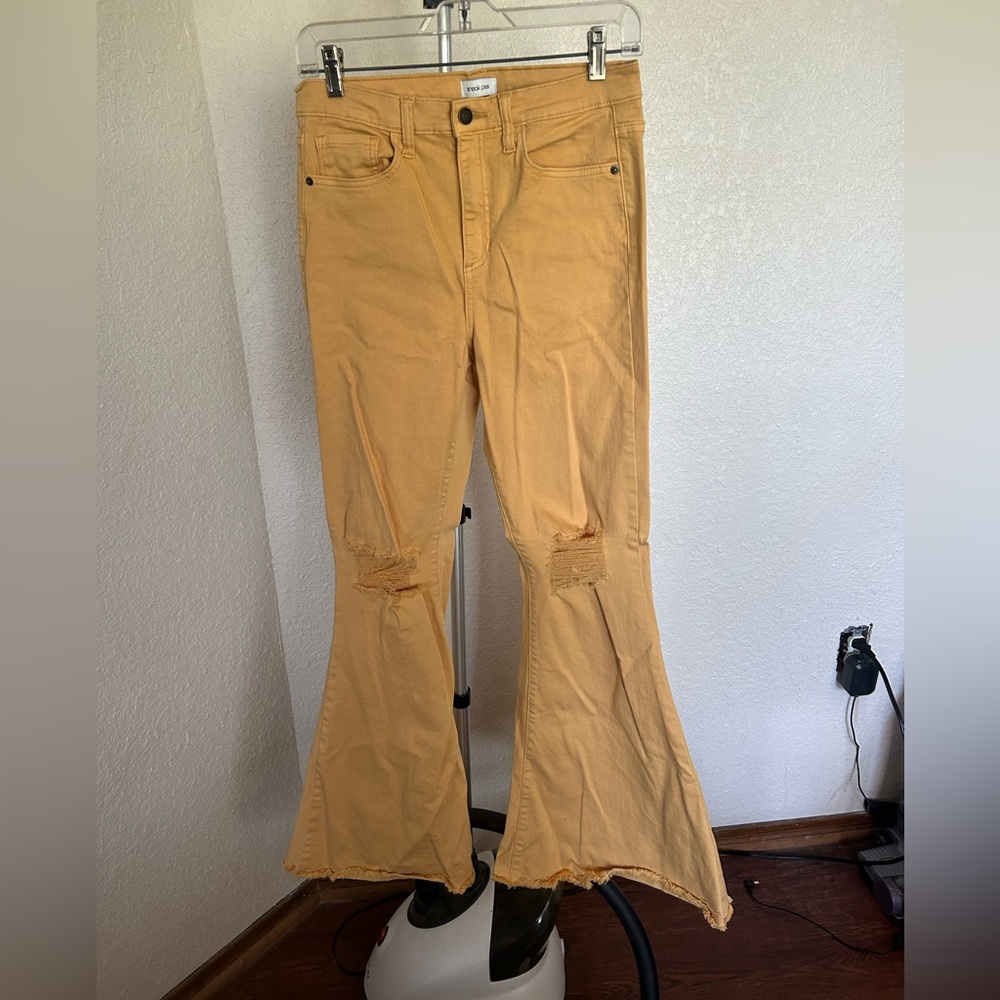 Yellow denim distressed bell bottoms